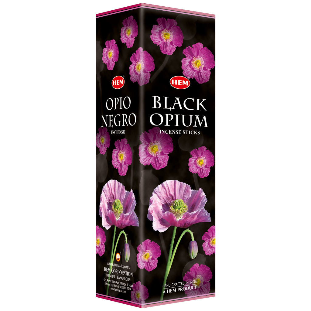 Box of HEM Black Opium incense sticks with pink flowers on a black background