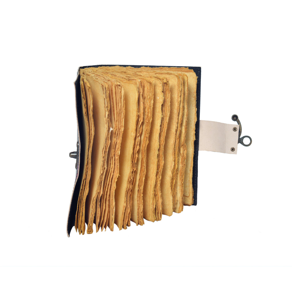 Open book with yellowed pages on a white background