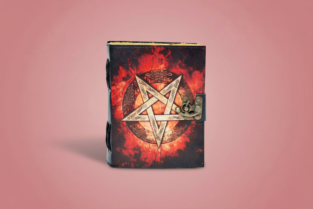 Journal with pentagram design on a red and black background