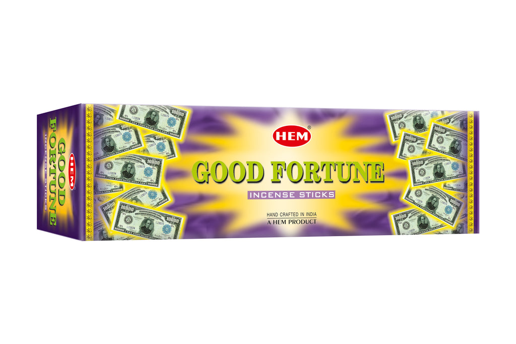 Box of HEM Good Fortune incense sticks with dollar bill design on a white background