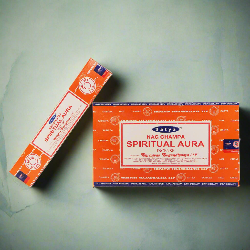 A collection of Satya incense boxes in various fragrances, displayed in an organized manner.