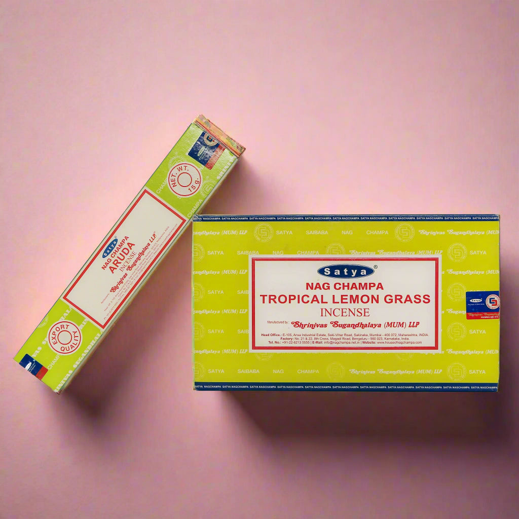 A collection of Satya incense boxes in various fragrances, displayed in an organized manner.