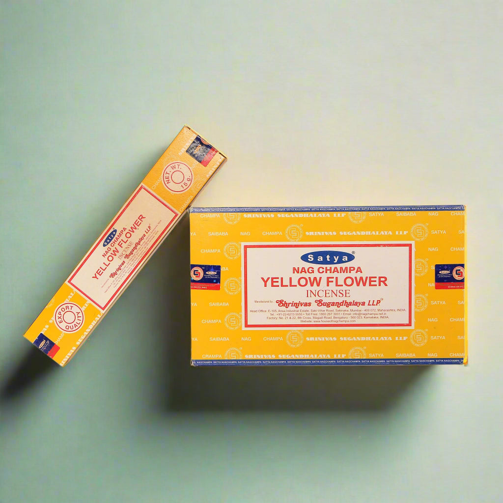 A collection of Satya incense boxes in various fragrances, displayed in an organized manner.